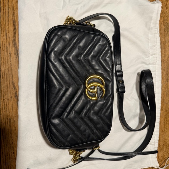 Gucci Handbags - Gucci Black Quilted Leather Crossbody with Gold GG Emblem